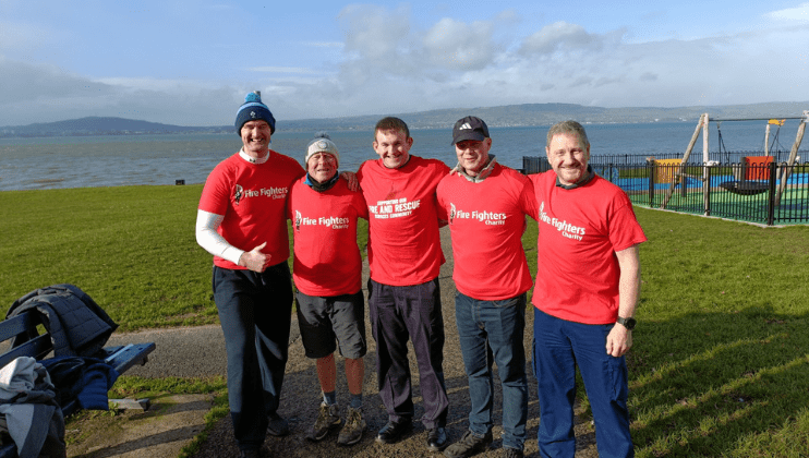 Five men wearing red 
